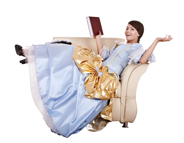 Menina em vestido azul loiro com livro na cadeira . — Fotografia de Stock
