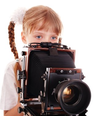 Child with old wood large format digital camera. clipart
