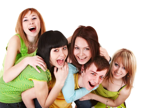 Fröhliche Gruppe junger Menschen in Grün. — Stockfoto