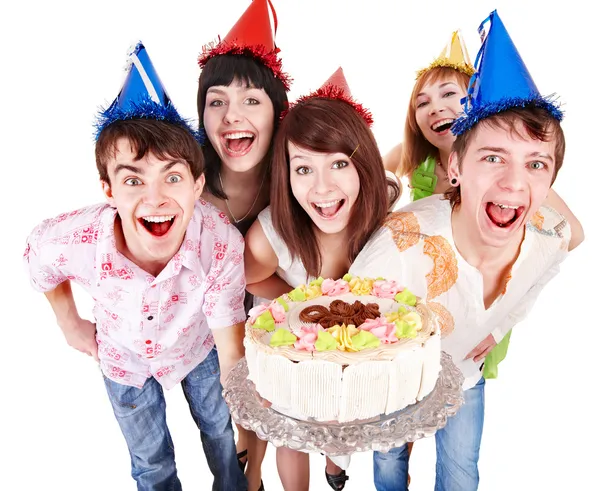 Grupp i partiet hatt med tårta. — Stockfoto