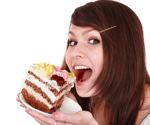 Flickan äta bit av kakan. — Stockfoto