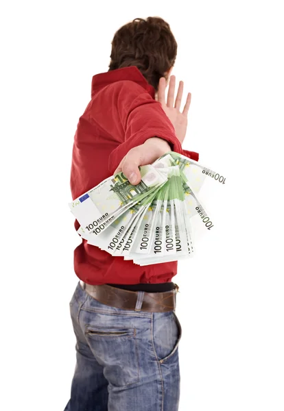 Mężczyzna w czerwonej koszulce i dżinsy z pieniędzy. — Zdjęcie stockowe