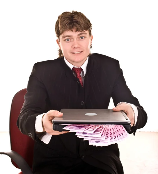 Homme d'affaires avec ordinateur portable et argent. — Photo