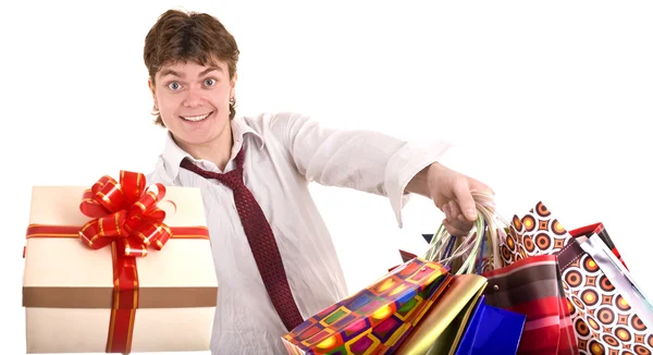 Ευτυχισμένος άνθρωπος με συσκευασία δώρου. ψώνια. — Φωτογραφία Αρχείου
