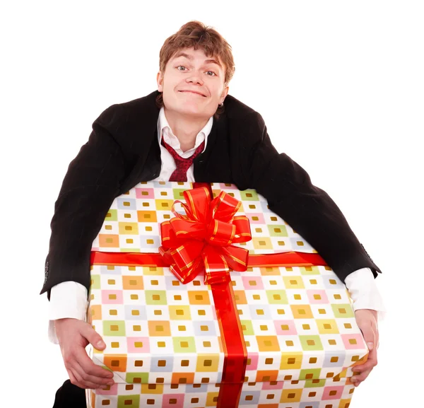 stock image Business man with big gift box.