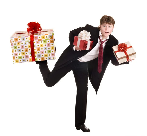 Man with falling gift box run. — Stock Photo, Image