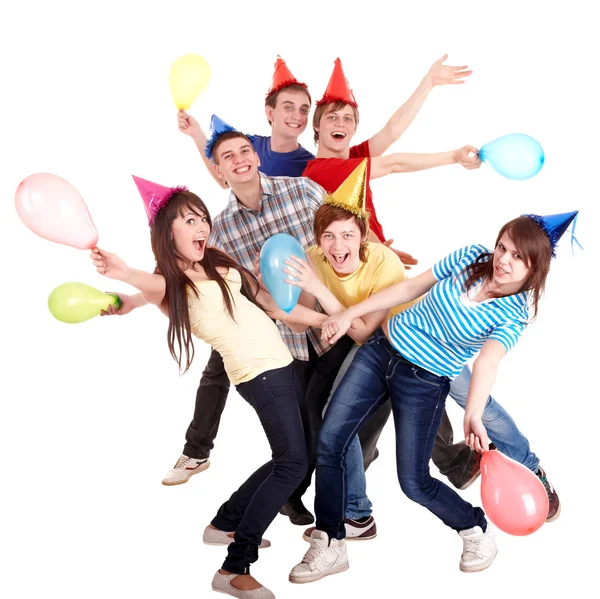 Groupe d'adolescents en chapeau de fête et ballon . — Photo