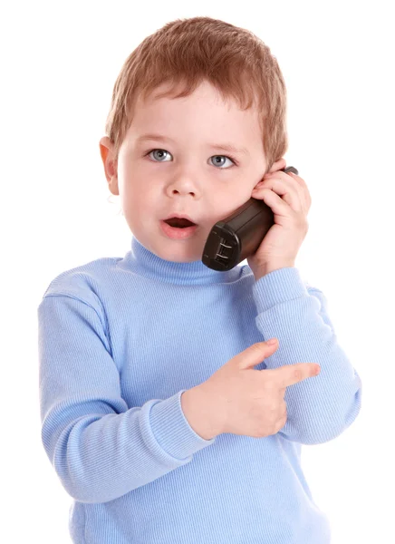 Chlapec v modrém hovoří na telefonu. — Stock fotografie