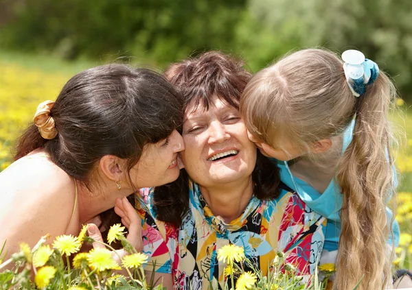 Grandmother with daughter and granddaughter outdoors. — Stock Photo, Image