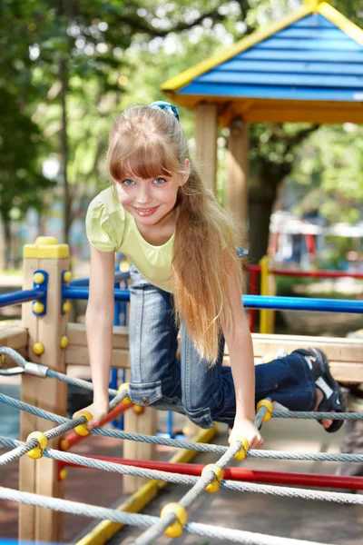 Child on slide outdoor in park. — Stock Photo, Image