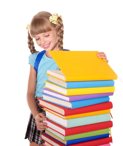 Écolière tenant pile de livres . — Photo