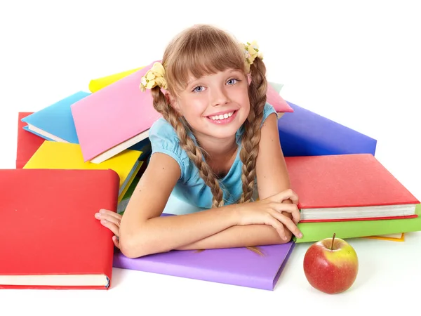 Bambino con mucchio di libri e mela . — Foto Stock
