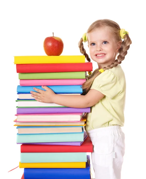 Bambino in possesso di mucchio di libri . — Foto Stock