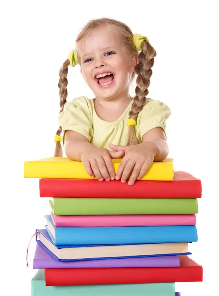 Niño sosteniendo pila de libros . — Foto de Stock