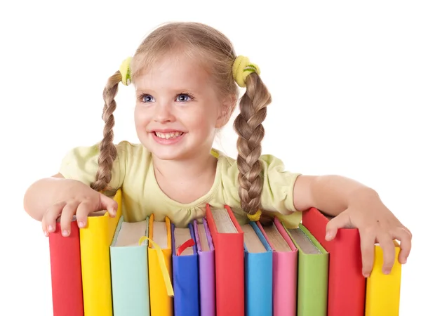 Niño sosteniendo pila de libros . — Foto de Stock