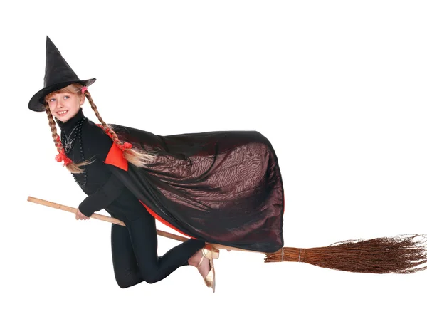 Child in costume Halloween witch fly on broom. — Stock Photo, Image