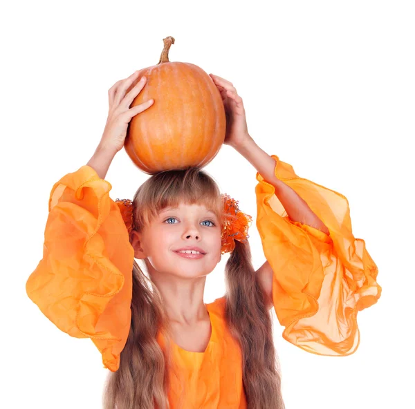Girl in orange long dress with pumpkin at thanksgiving. — Stock Photo, Image