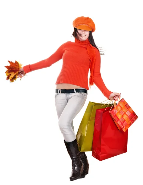 Menina em laranja segurando saco de compras . — Fotografia de Stock