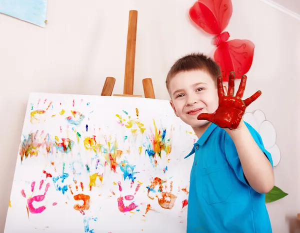 Kind schilderij op ezel van handen. — Stockfoto