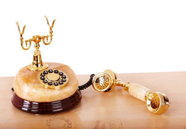 stock image Old gold telephone from onyx.