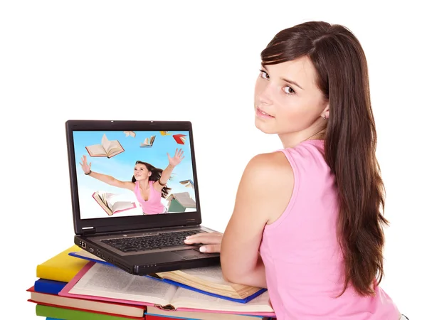 Menina com laptop aberto e livro . — Fotografia de Stock