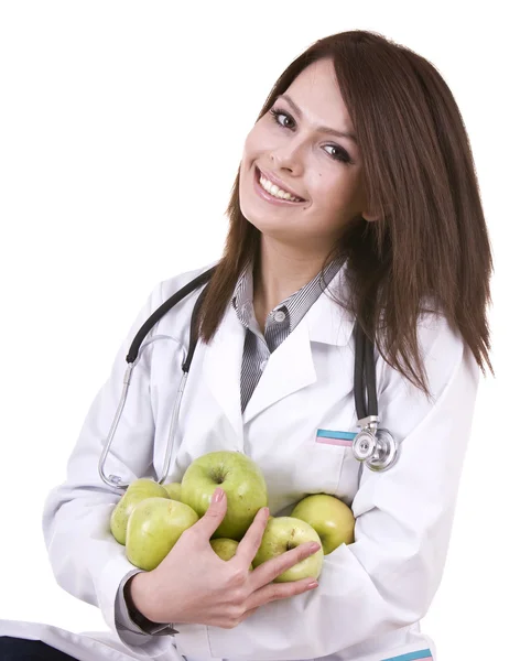 Dokter met stethoscoop en groep groene appels. — Stockfoto
