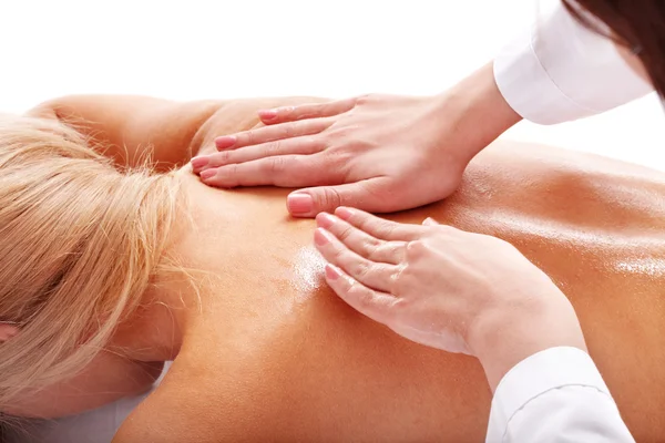 Massage av kvinnliga tillbaka. — Stockfoto