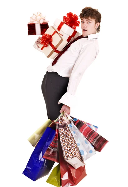 Man with falling group gift box and shopping bag. — Stock Photo, Image
