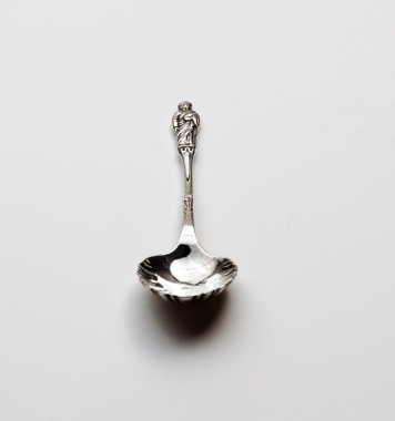 Antique sterling silver apostle spoon clipart