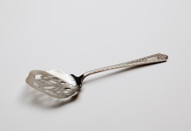 Antique sterling silver cake spoon clipart