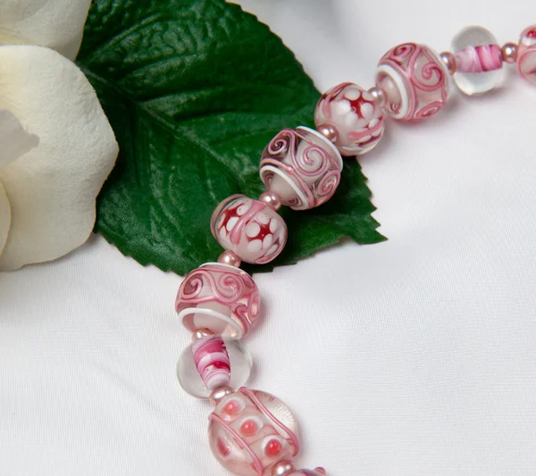 Hand made bracelets in pink — Stock Photo, Image