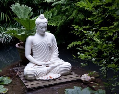 Buddha statue in pond clipart