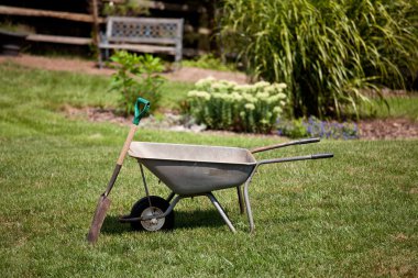 Wheelbarrow and spade clipart