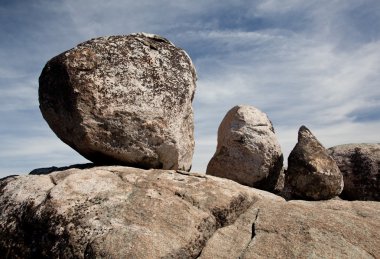 Three balanced boulders clipart