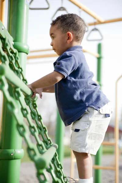 Multi-racial boy at the park — Stock Photo, Image