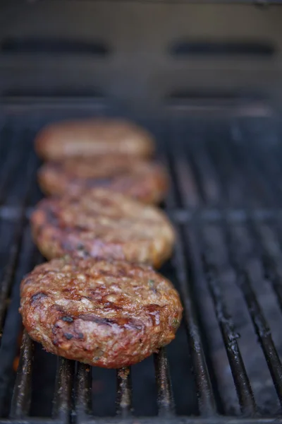 Burgers on the grill — Stock Photo, Image