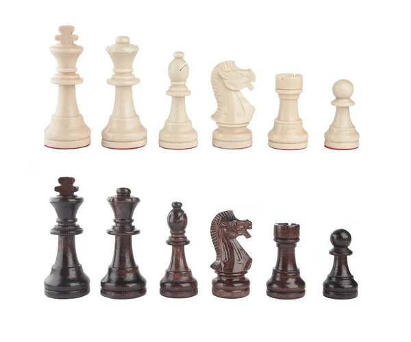 Um conjunto de peças de xadrez em preto e branco — Fotografia de Stock