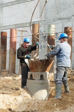Workers at piling works clipart