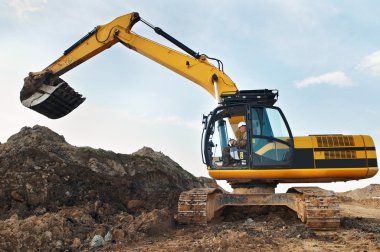 Loader excavator in a quarry clipart