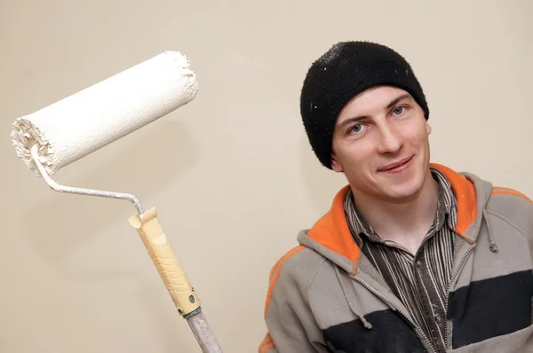 Painter worker decorator with roller — Stock Photo, Image