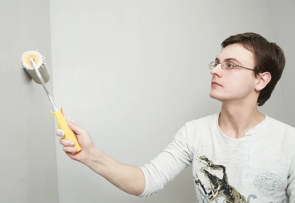 Painter worker decorator with roller — Stock Photo, Image