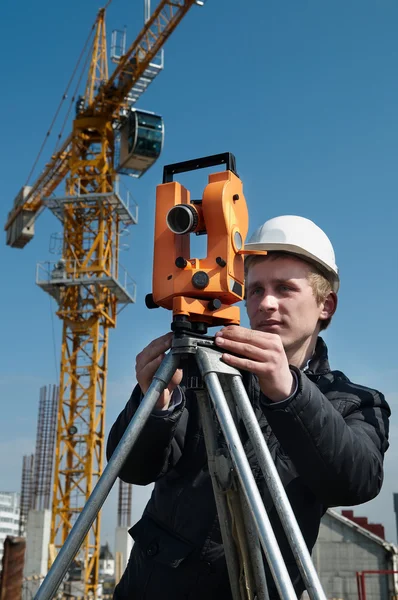 Surveyor with transit level equipment — Stock Photo, Image