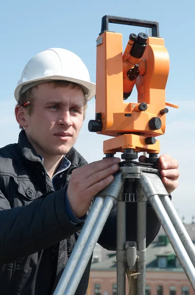 Surveyor with transit level equipment — Stock Photo, Image
