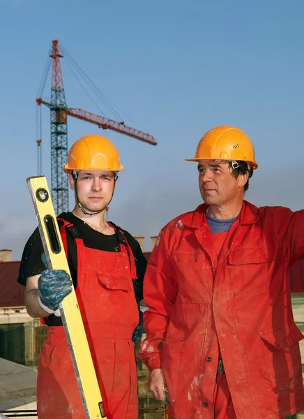 Trabajadores de la construcción en obra — Foto de Stock