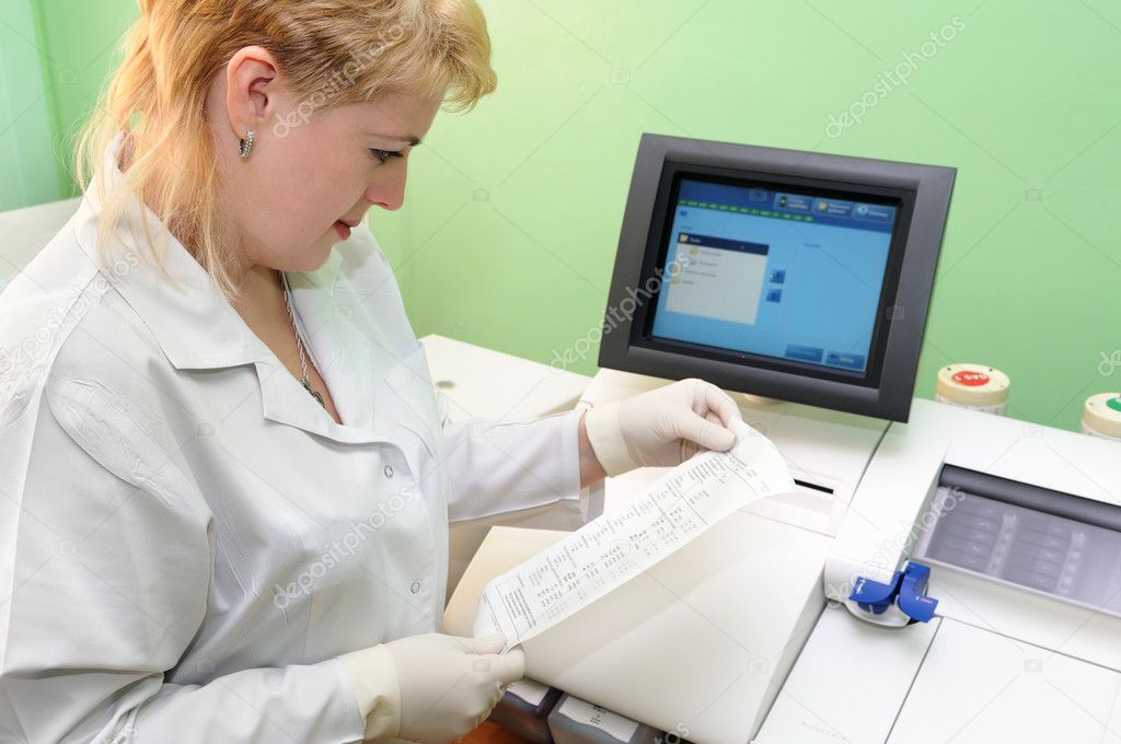 Woman Scientist using medical equipment
