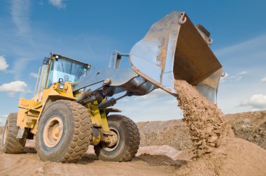 Wheel loader excavation working clipart