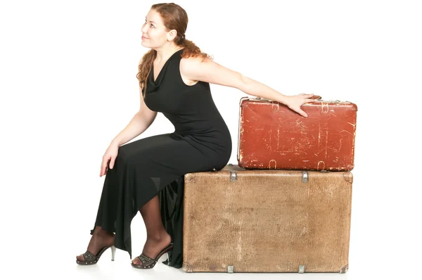 One beautiful woman on luggage — Stock Photo, Image