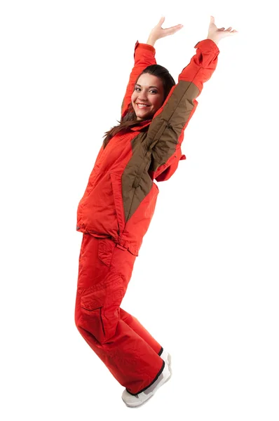 Donna che salta in giacca rossa snowboard — Foto Stock