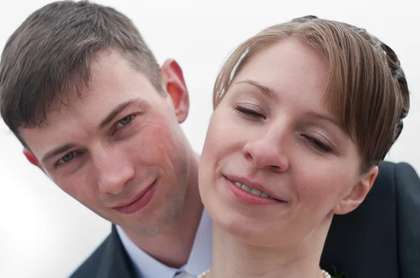 Jonge gelukkige liefdevol paar. Close-up van twee gezichten — Stockfoto