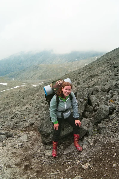 Active sportswoman in mountain — Stock Photo, Image
